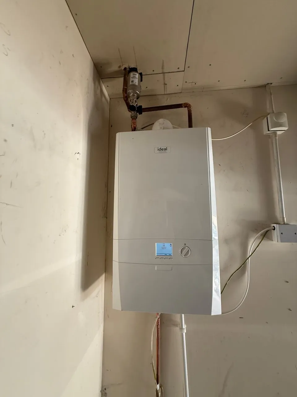 Boiler Installation in Kirkcaldy and Fife: New Ideal combi boiler installation with magnetic system filter and neat copper pipework